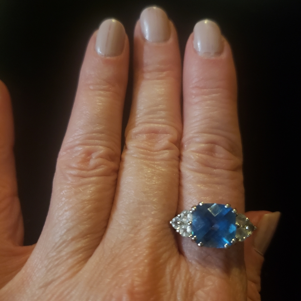 10K white gold London Blue Topaz w clear CZs Ring